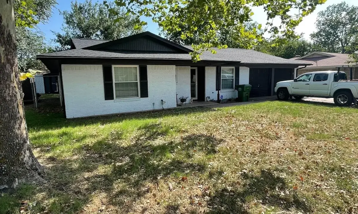 Professional roofing crew working on a residential roof in Myrtletown